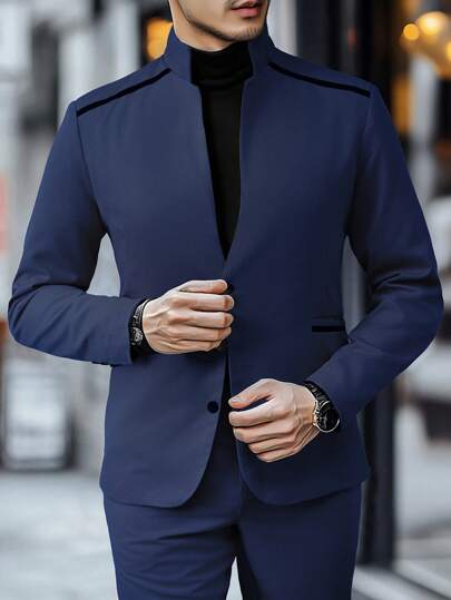 Ensemble composé d'une veste à simple boutonnage à manches longues de couleur unie et d'un pantalon